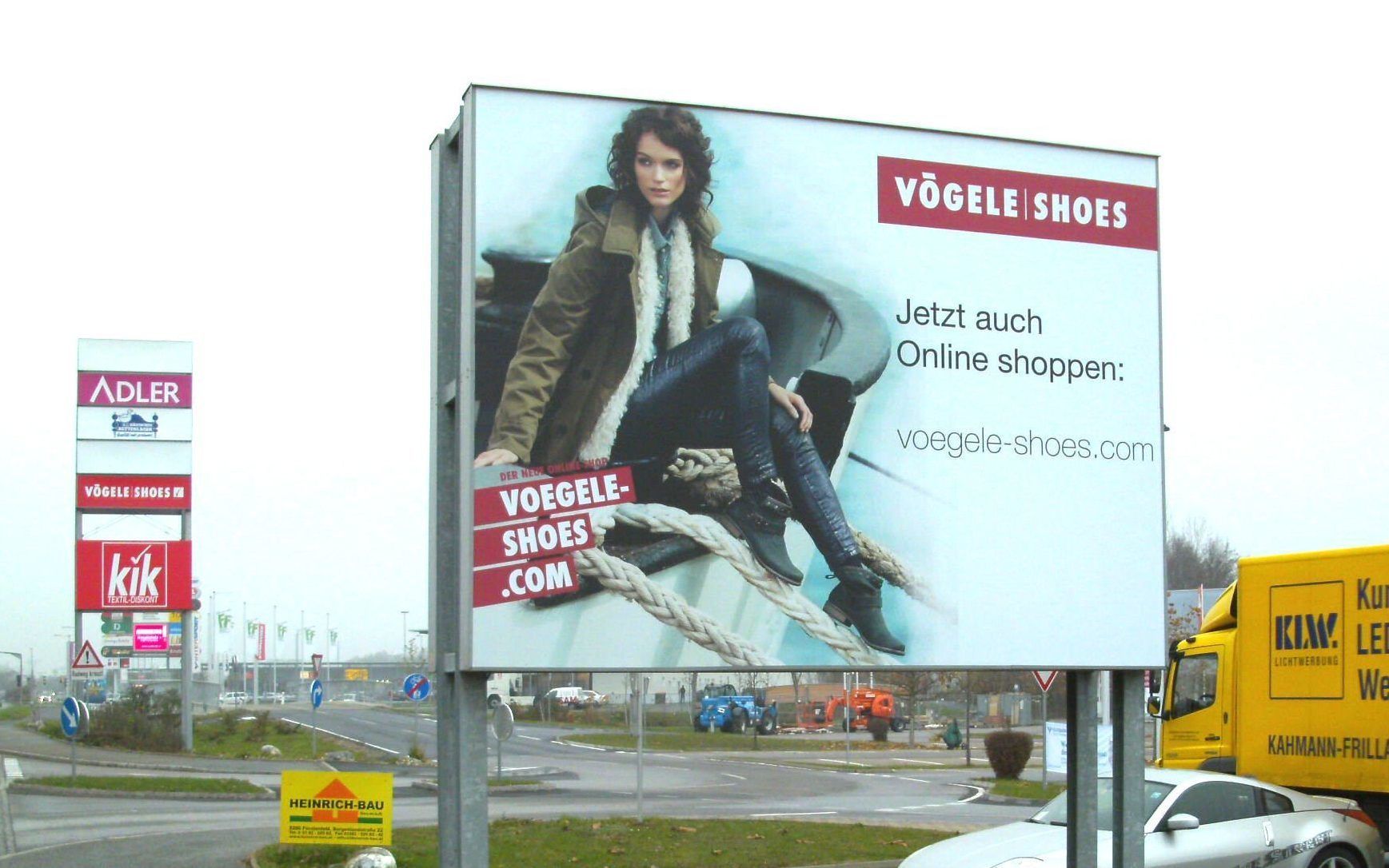 Vögele Shoes Spannfolienschild